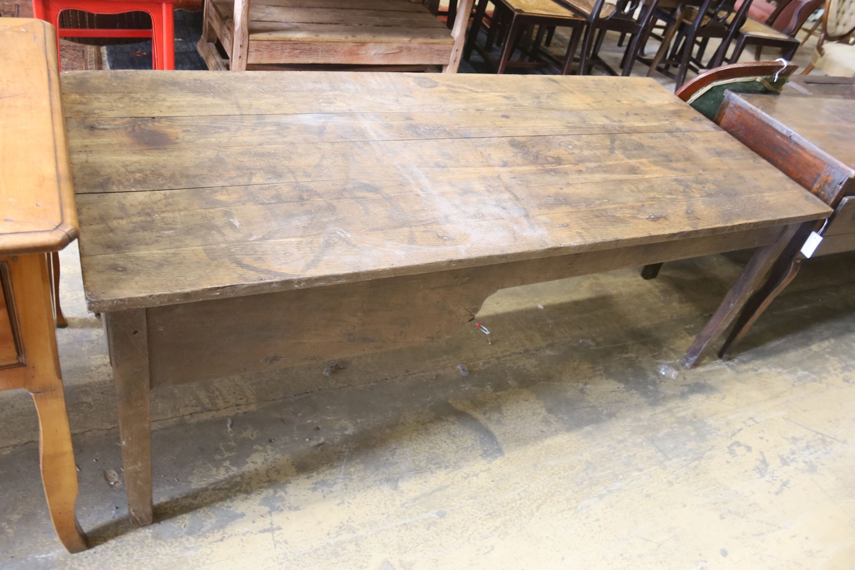 A 19th century Brittany elm kitchen table, length 186cm, depth 81cm, height 69cm